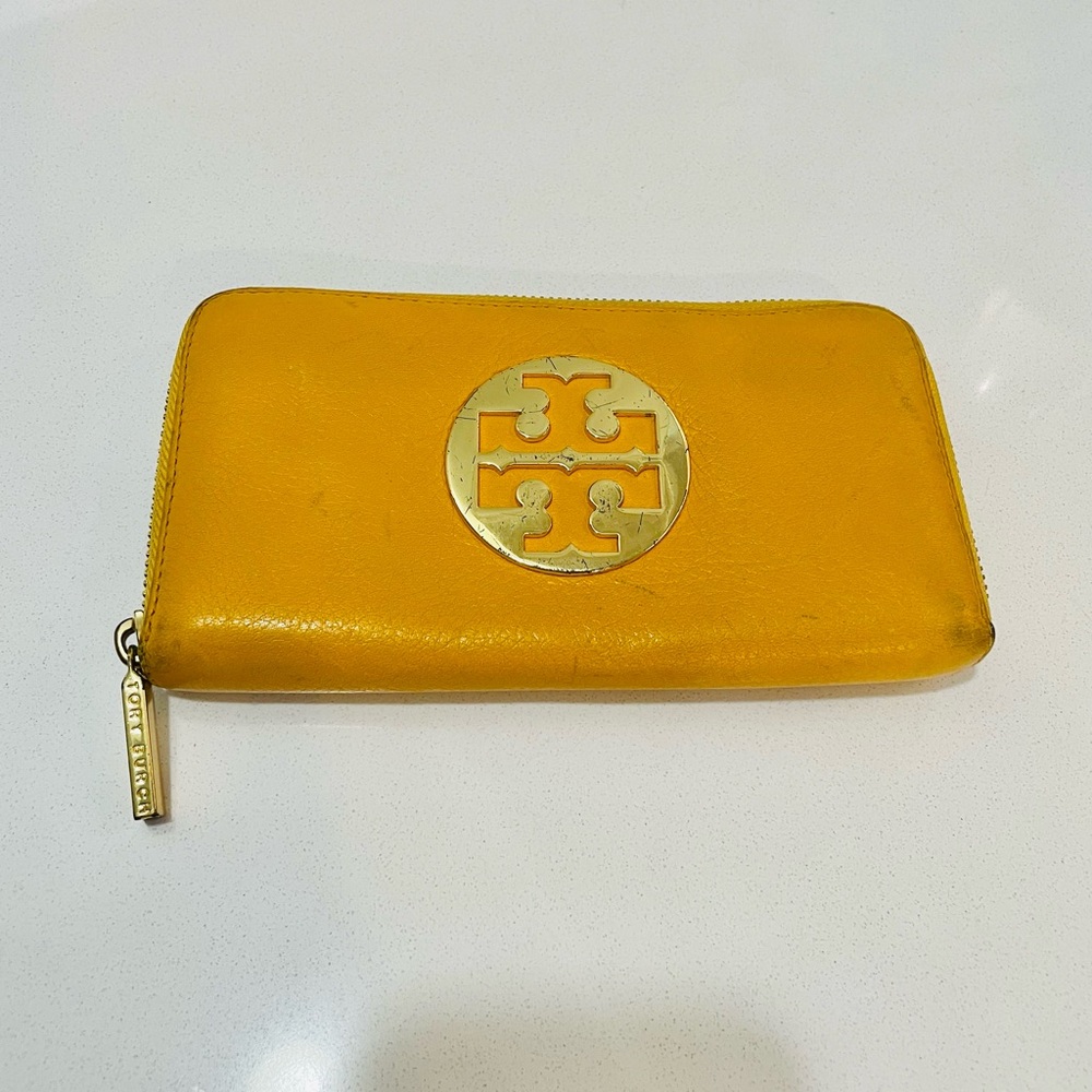 Tory Burch yellow zip-around wallet
